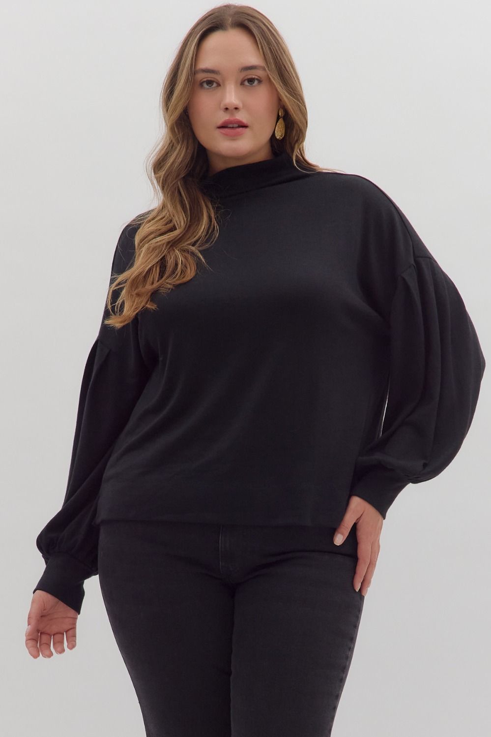 Solid long sleeve mock neck knit top